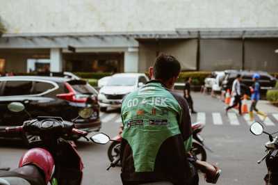 Isu Merger Gojek dengan Grab Kembali Muncul, GoTo Buka Suara