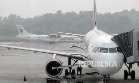 Kabut Asap Sulitkan Tiga Maskapai Mendarat di Pekanbaru. Kabut Asap Sulitkan Tiga Maskapai Mendarat di Pekanbaru.