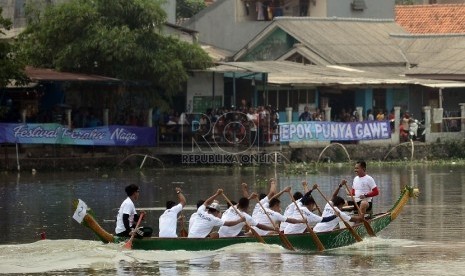 Yuk, Saksikan Festival Pacu Jalur Teluk Kuantan Riau