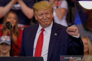Presiden AS Donald Trump Tak Ingin Berbisnis dengan Huawei Presiden AS Donald Trump Tak Ingin Berbisnis dengan Huawei